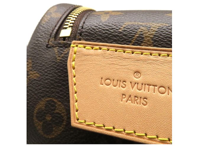 Clutch Louis Vuitton Monogram Dopp Kit Marrone Monogramma - vista 9