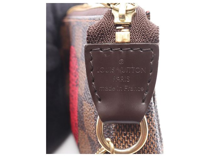 Borsa Louis Vuitton Mini Pochette Accessoires Damier Ebene Marrone - vista 4