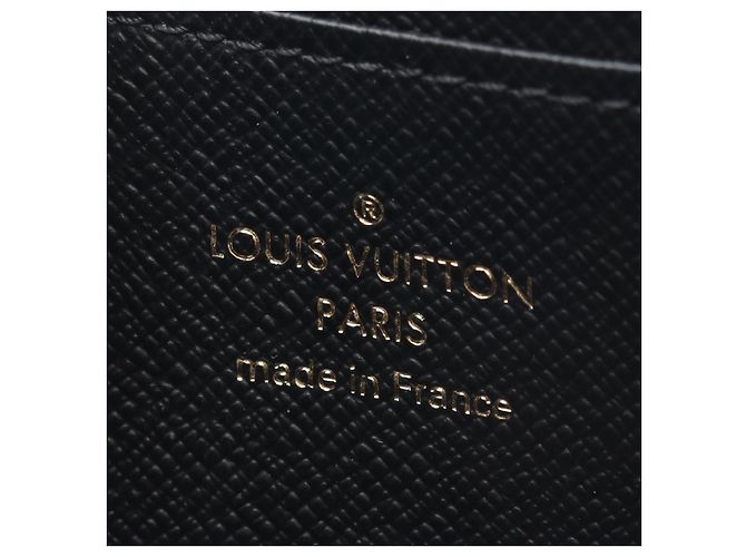 Monedero Louis Vuitton Zippy Monogram Giant Castaño - vista 4