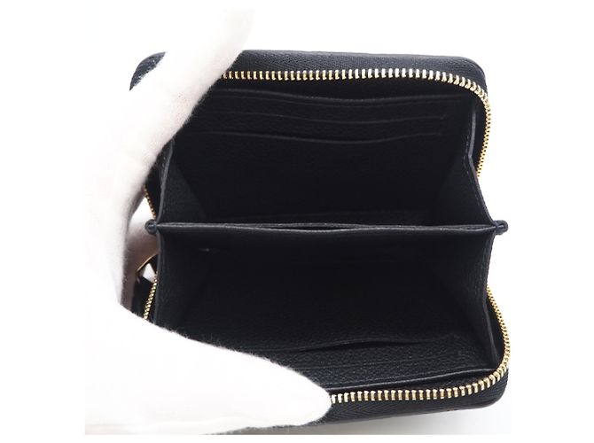 Monedero Zippy Monogram Empreinte Louis Vuitton Negro - vista 9