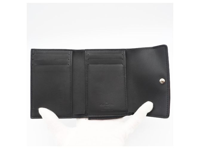Portafoglio pieghevole Louis Vuitton Taurillon Portefeuille Pilot Noir Nero - vista 10