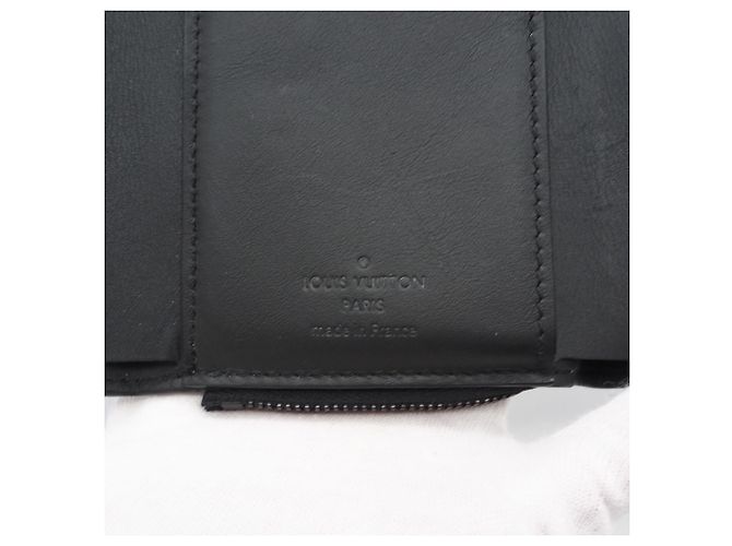 Portafoglio pieghevole Louis Vuitton Taurillon Portefeuille Pilot Noir Nero - vista 15