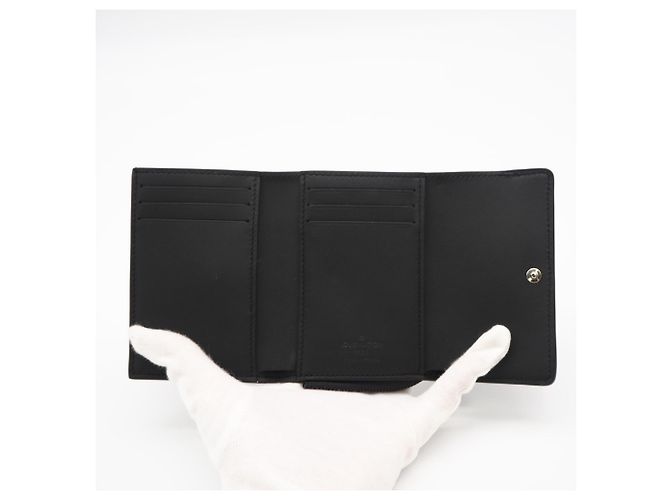 Louis Vuitton Taurillon Portefeuille Pilot Wallet Nero - vista 11