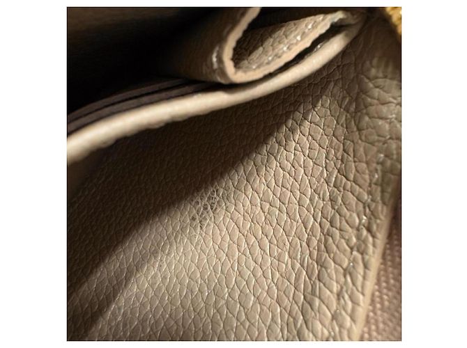 Monedero Zippy Monogram Empreinte Louis Vuitton Beige - vista 12