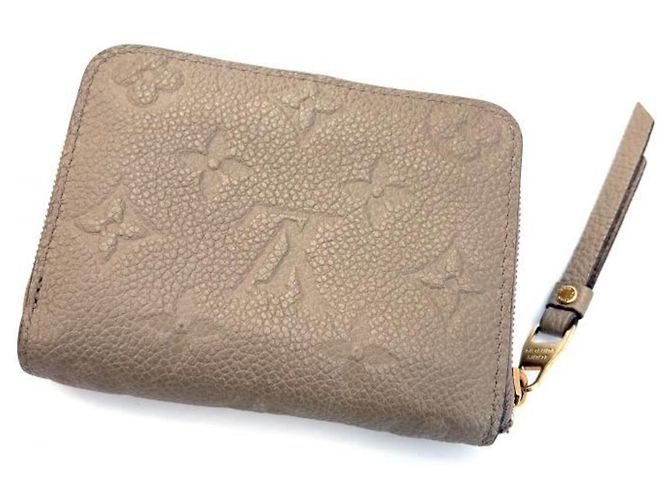Monedero Zippy Monogram Empreinte Louis Vuitton Beige - vista 2
