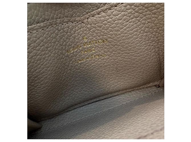 Monedero Zippy Monogram Empreinte Louis Vuitton Beige - vista 3