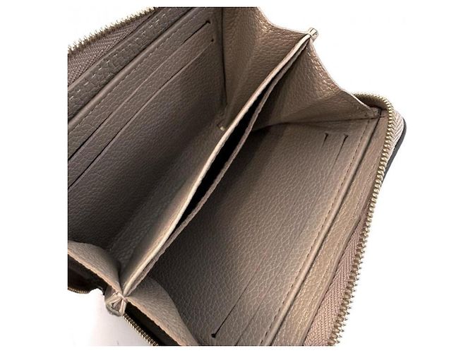 Monedero Zippy Monogram Empreinte Louis Vuitton Beige - vista 4