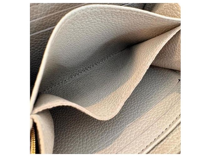 Monedero Zippy Monogram Empreinte Louis Vuitton Beige - vista 5