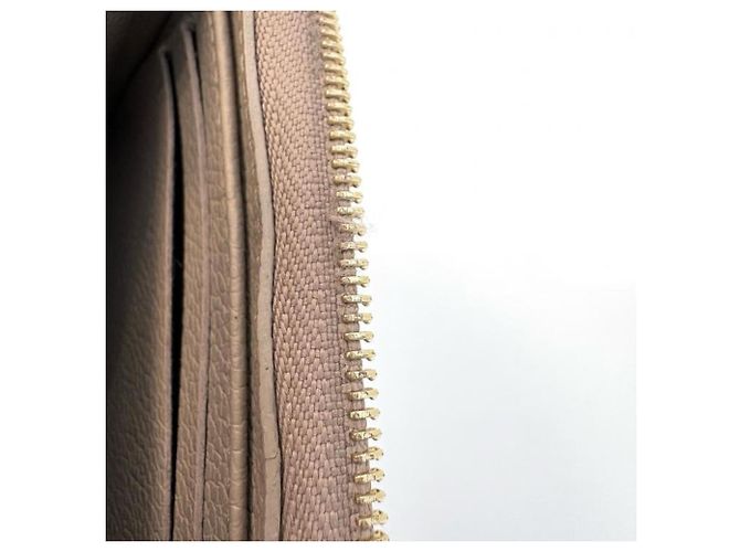 Monedero Zippy Monogram Empreinte Louis Vuitton Beige - vista 9