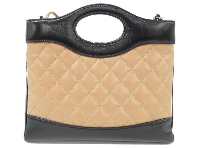 Bolso Chanel 31 Line AS4133 Negro Beige - vista 2