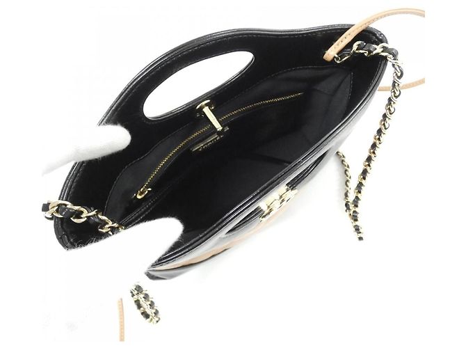 Bolso Chanel 31 Line AS4133 Negro Beige - vista 5