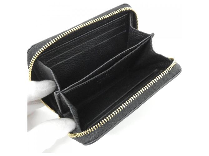 Monedero Zippy Monogram Empreinte Louis Vuitton Negro - vista 5