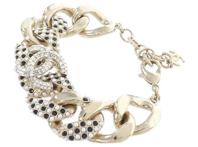 Pulsera Charm Chanel Negro Blanco Dorado - vista 2
