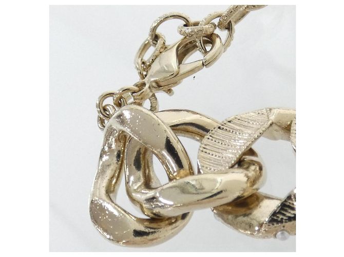 Pulsera Charm Chanel Negro Blanco Dorado - vista 4