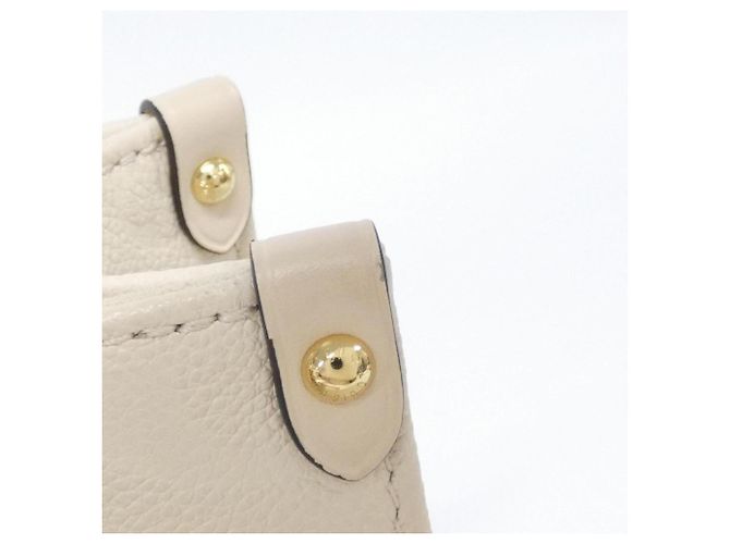 Borsa Louis Vuitton Monogram Empreinte OnTheGo PM Beige - vista 3