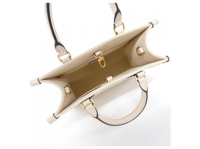 Borsa Louis Vuitton Monogram Empreinte OnTheGo PM Beige - vista 6