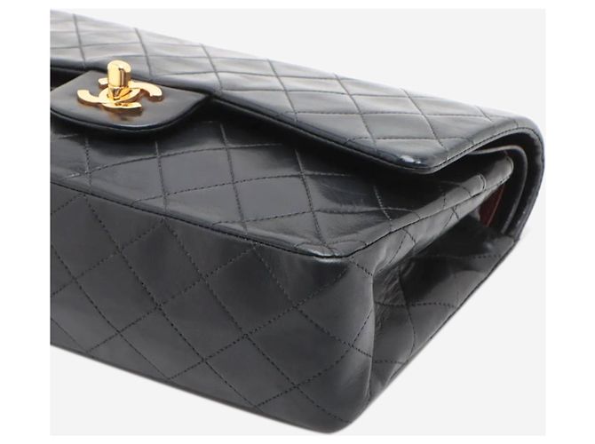 Chanel Schwarze Vintage 1991 Classic Double Flap Tasche aus Lammleder, Größe medium - Ansicht 11
