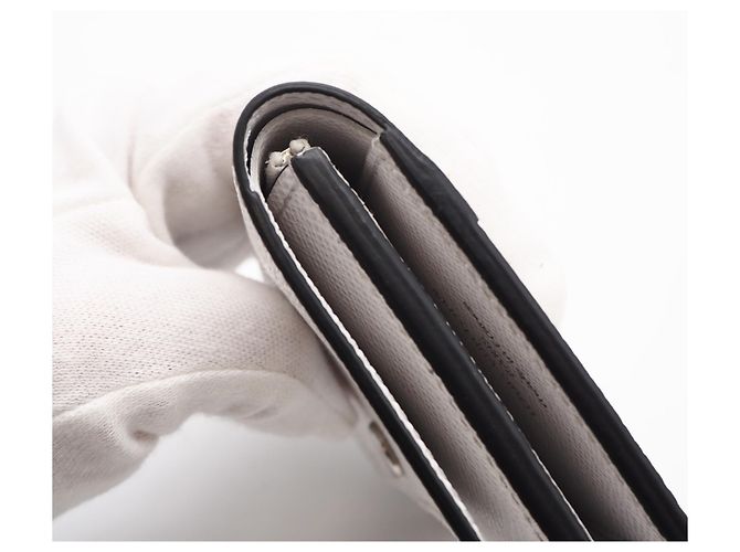 Louis Vuitton Taigarama Victor Wallet Brown White - view 9