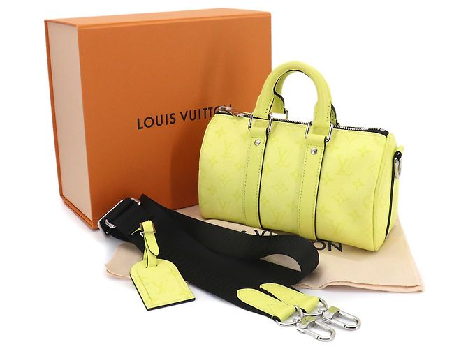 Borsa Louis Vuitton Keepall Bandouliere 25 D'oro - vista 2