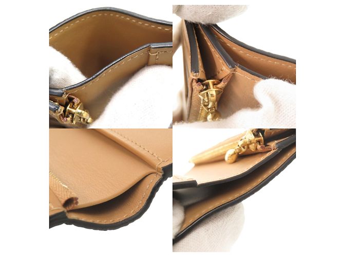 Louis Vuitton Bi-Fold Wallet aus schwarzem Taurillon-Leder - Ansicht 9