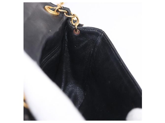 Borsa a tracolla CHANEL con catena in pelle di agnello nera e oro CC Auth 189894 Nero D'oro - vista 25