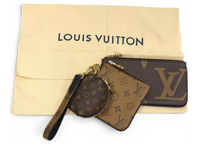 Pochette Trio in pelle Monogram Giant Reverse Louis Vuitton Marrone - vista 2