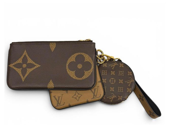 Pochette Trio in pelle Monogram Giant Reverse Louis Vuitton Marrone - vista 3