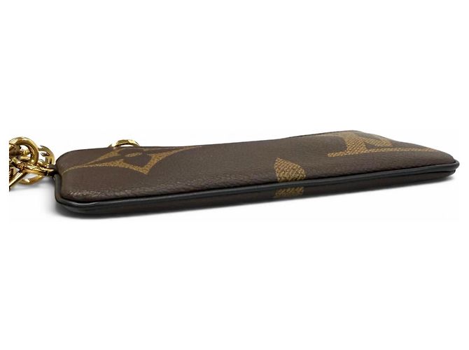 Pochette Trio in pelle Monogram Giant Reverse Louis Vuitton Marrone - vista 4