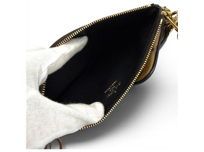 Pochette Trio in pelle Monogram Giant Reverse Louis Vuitton Marrone - vista 5