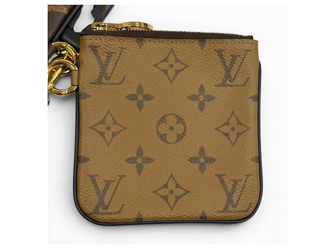 Pochette Trio in pelle Monogram Giant Reverse Louis Vuitton Marrone - vista 7