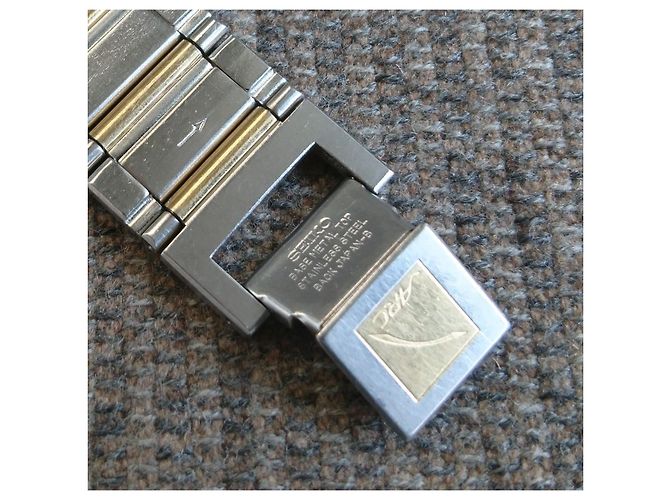 Relógio Seiko Arc Quartz Retangular Ref. 7320-6360 Prata Dourado - vista 12