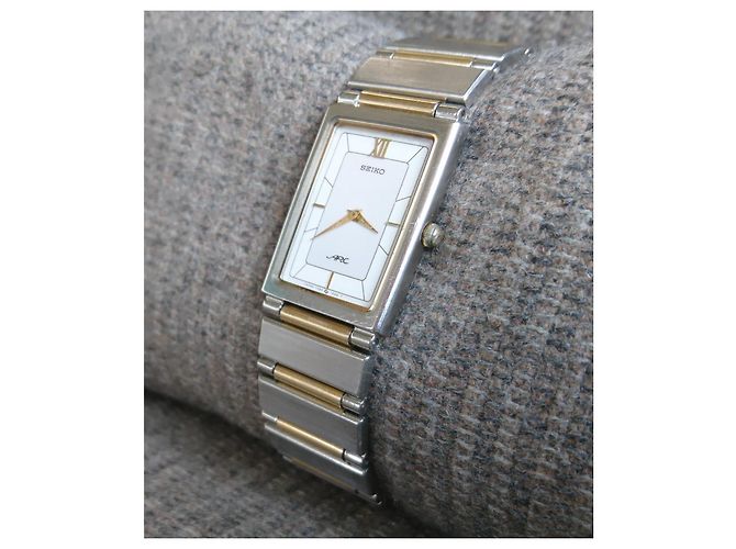 Relógio Seiko Arc Quartz Retangular Ref. 7320-6360 Prata Dourado - vista 2