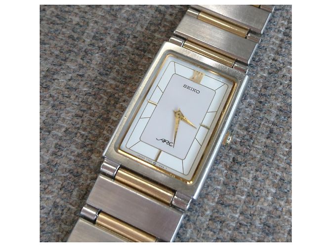 Relógio Seiko Arc Quartz Retangular Ref. 7320-6360 Prata Dourado - vista 3
