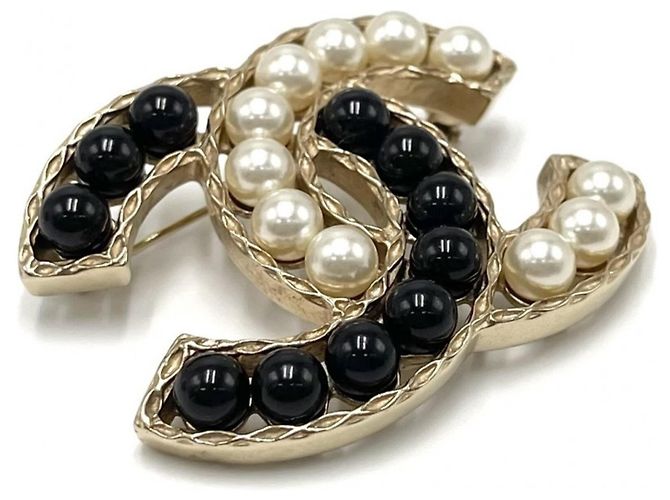 Broche de mujer Chanel en negro, dorado y blanco - vista 3