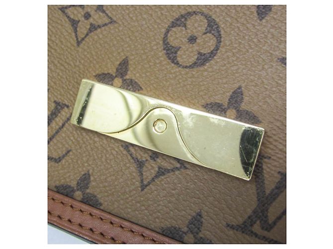 Louis Vuitton Monogram Reverse Dauphine Chain Wallet M68746 Marrone Beige - vista 12