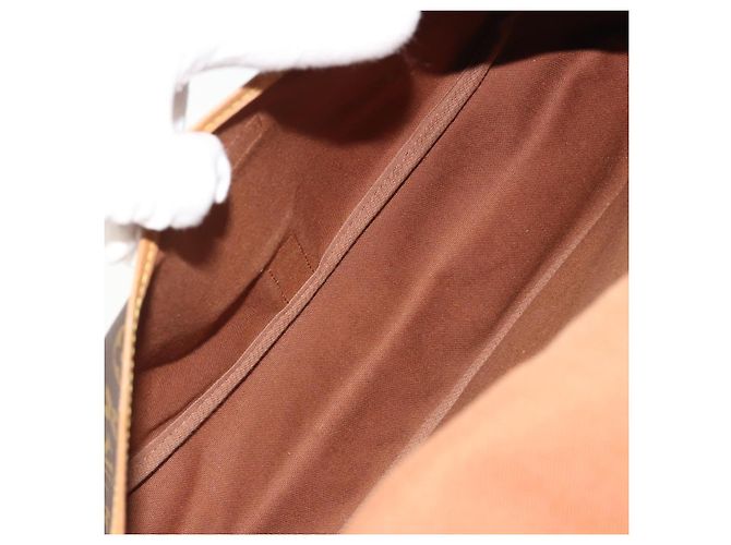 Louis Vuitton Saumur Monogram Canvas 35 Marrone - vista 5