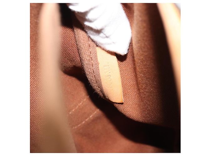 Louis Vuitton Saumur Monogram Canvas 35 Marrone - vista 7