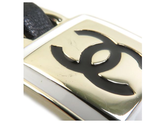Pinza para el pelo Chanel con logo Coco Negro Blanco Dorado - vista 5
