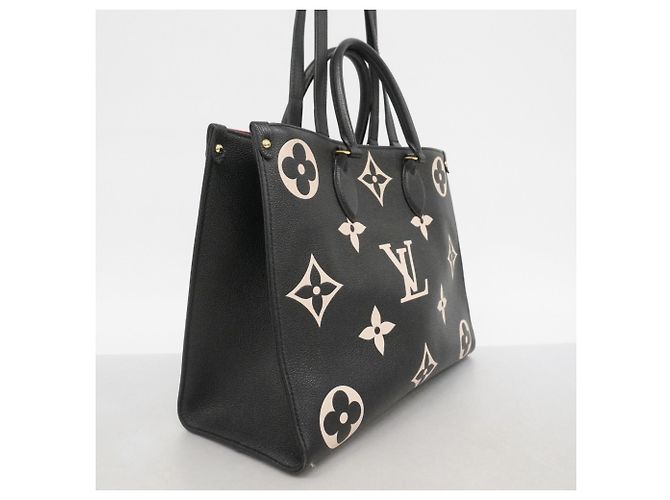 Borsa Tote Louis Vuitton Monogram Empreinte Bicolor OnTheGo MM Nero Beige - vista 2