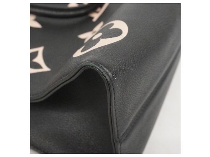 Borsa Tote Louis Vuitton Monogram Empreinte Bicolor OnTheGo MM Nero Beige - vista 8