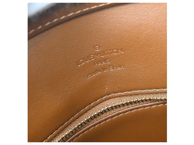 Louis Vuitton Houston Monogram Vernis Castaño - vista 4