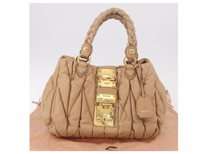 Borsa a mano Miu Miu Matelasse in pelle beige oro Auth 191692A D'oro - vista 24