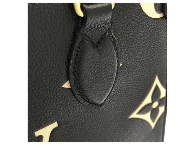 Borsa Louis Vuitton Bicolor Monogram Empreinte OnTheGo PM Nero Beige - vista 4