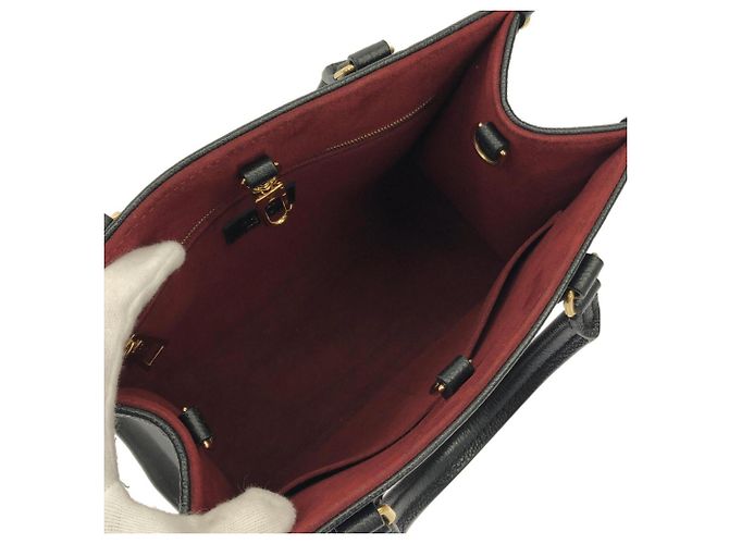 Borsa Louis Vuitton Bicolor Monogram Empreinte OnTheGo PM Nero Beige - vista 6