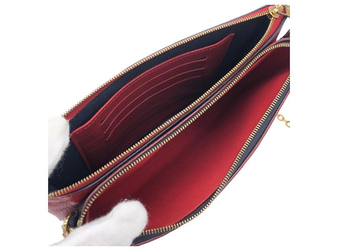 Louis Vuitton Monogram Empreinte Pochette Double Zip Rosso - vista 9