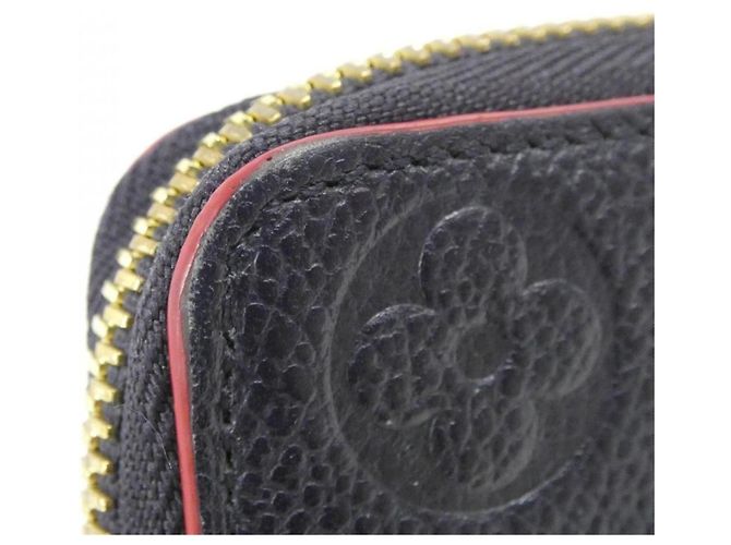 Cartera Louis Vuitton Monogram Empreinte Clemence Roja - vista 3