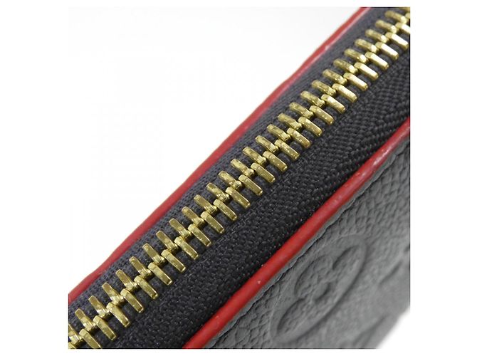Cartera Louis Vuitton Monogram Empreinte Clemence Roja - vista 4