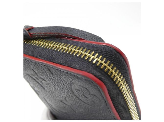 Cartera Louis Vuitton Monogram Empreinte Clemence Roja - vista 5