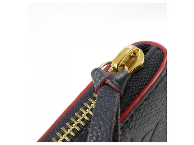Cartera Louis Vuitton Monogram Empreinte Clemence Roja - vista 6