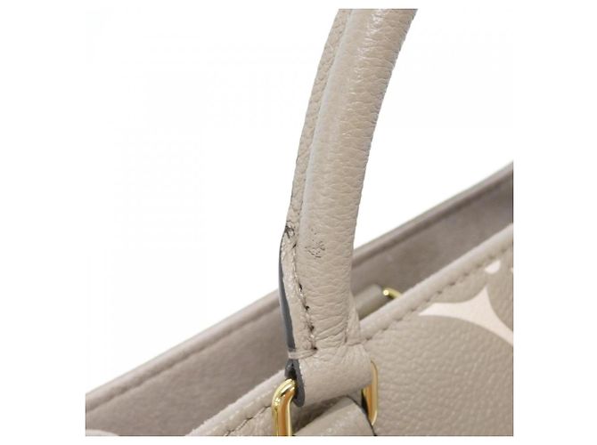 Borsa Louis Vuitton Bicolor Monogram Empreinte OnTheGo PM Beige Grigio - vista 3